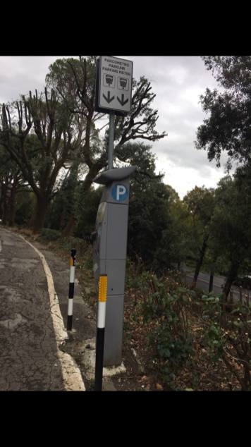 Parking meter that also sells transit tickets.